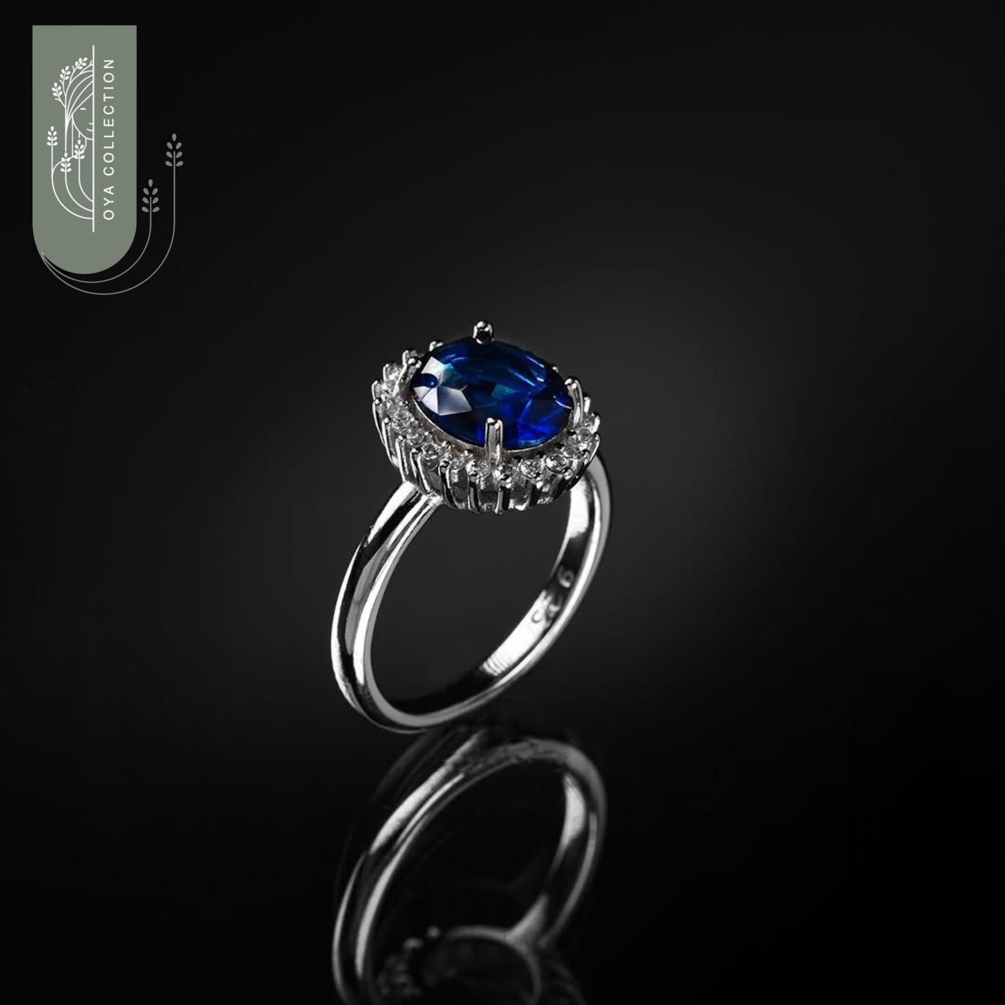 Blue Sapphire Oval shaped silver 925 ring with Zirconia frame