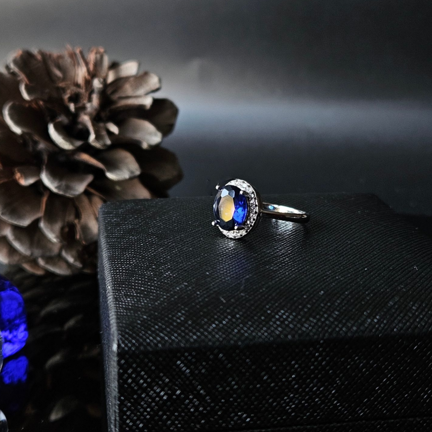 Sterling silver ring 925, medium size Oval shaped Blue Sapphire stone and zirconia all lined with Zirconia frame