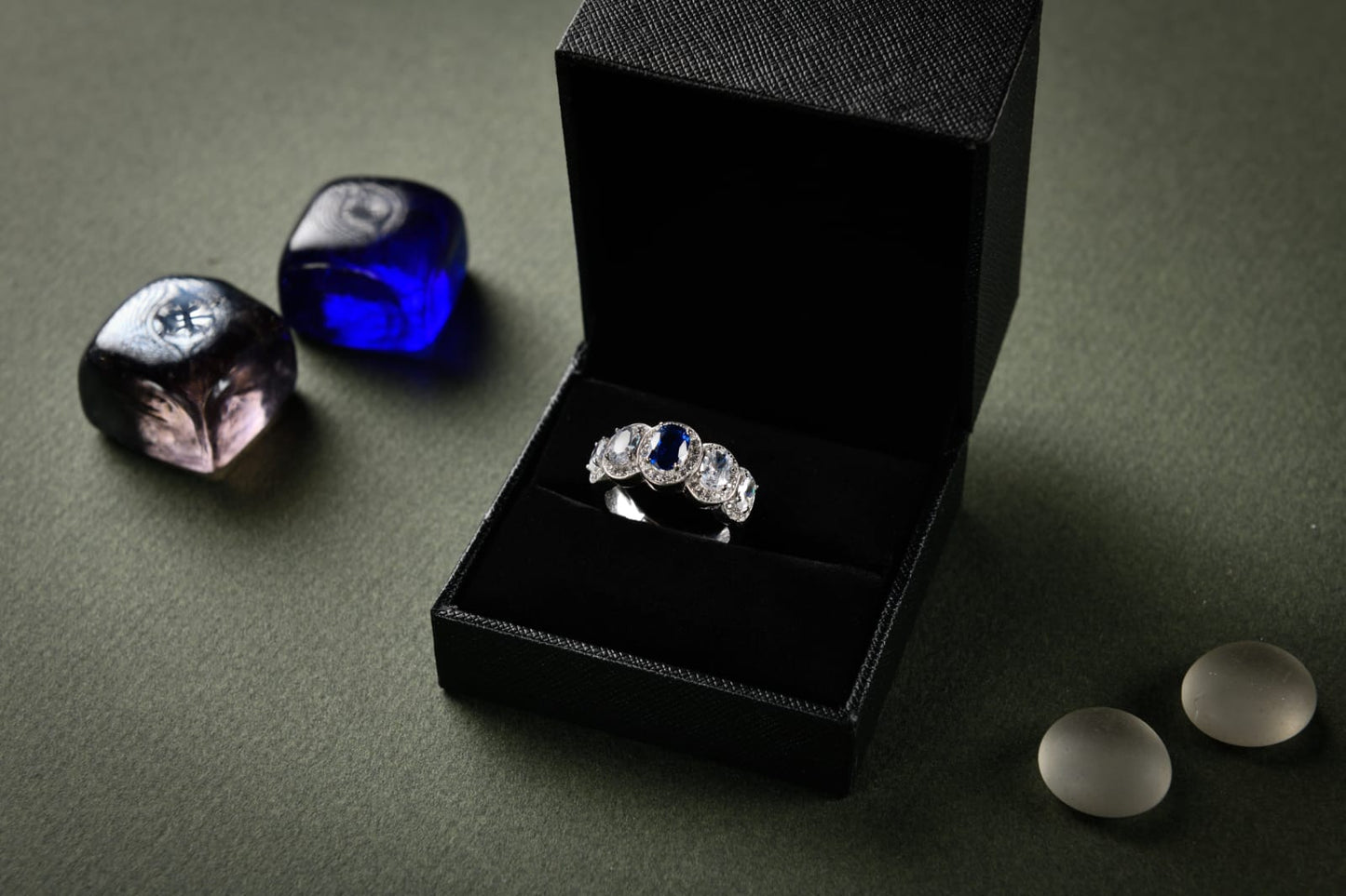 Sterling silver ring 925, 5 stones Oval shaped Blue Sapphire stone and zirconia all lined with Zirconia frame